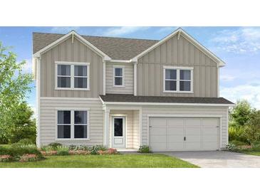 Charming two-story home featuring a two-car garage, beautiful landscaping, and a welcoming entrance at 229 Groveton Ct, Euharlee, GA 30145