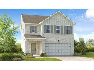 Charming two-story home with brick and siding exterior, well-manicured lawn, and inviting entry at 1744 Fawlocke Run, Loganville, GA 30052