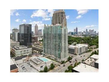 Stunning aerial view of the high-rise apartment and the surrounding city skyline at 361 17Th Nw St # 1717, Atlanta, GA 30363