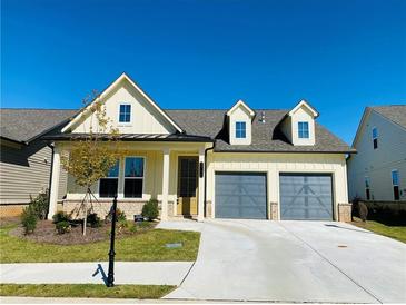 Charming home with a two-car garage, manicured lawn, and lovely curb appeal at 2785 Lifford Way, Duluth, GA 30097