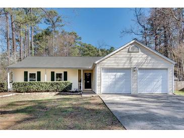 Charming single-story home with a well-manicured lawn, two-car garage, and inviting curb appeal at , Kennesaw, GA 30152