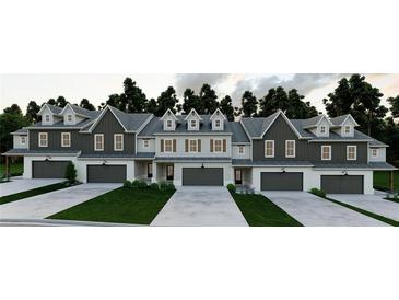 Beautiful townhomes featuring individual driveways and garages and attractive modern farmhouse design at 210 Sharon Ln, Loganville, GA 30052