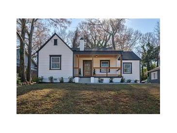 Charming renovated craftsman home with a covered front porch and updated landscaping at 1006 Byron Sw Dr, Atlanta, GA 30310