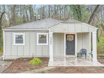 Charming single-story home featuring a cozy front porch and freshly painted exterior at 3395 Lake Valley Nw Rd, Atlanta, GA 30331