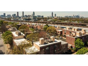 Stunning brick apartment complex with cityscape views provides a contemporary and convenient urban lifestyle at 791 Wylie Se St # 105, Atlanta, GA 30316