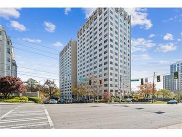 Exterior view of modern condominium complex with manicured landscaping and surrounding city views at 2479 Peachtree Ne Rd # 1703, Atlanta, GA 30305