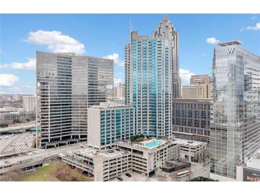 This high rise condo boasts city views and an outdoor rooftop pool in the heart of downtown Atlanta at 400 W Peachtree Nw St # 1408, Atlanta, GA 30308
