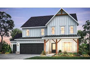 Charming two-story home featuring board and batten siding, a black shingle roof, and a two-car garage at 280 Rockledge Sw Bnd, Powder Springs, GA 30127
