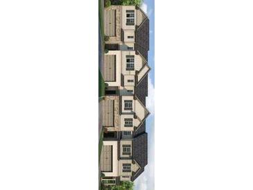 A street view of attractive new construction townhomes with a symmetrical design at 2427 Bayberry St, Acworth, GA 30101