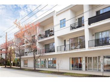 Modern condo building featuring private balconies and street-level retail spaces at 455 Glen Iris Ne Dr # D, Atlanta, GA 30308