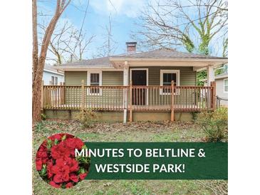 Charming single-story home with a covered front porch at 706 S Grand Nw Ave, Atlanta, GA 30318