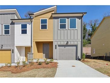 Charming new construction townhome with modern architecture and inviting curb appeal at 1696 Gunnin Nw Trce # 244, Atlanta, GA 30318