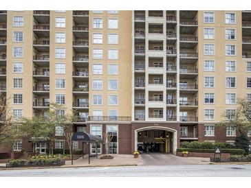 High-rise building exterior displaying numerous balconies and a brick-covered entrance at 1101 Juniper St # 61, Atlanta, GA 30309