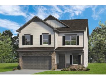 Charming two-story home with stone and siding exterior, manicured lawn, and an attached two-car garage at 146 Silver Leaf Trce, Douglasville, GA 30134