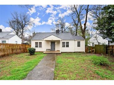 Charming single-story home featuring a cozy front porch and well-maintained front yard at 996 Moreland Se Ave, Atlanta, GA 30316