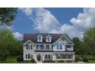 Charming two-story home with a classic design, dormer windows, and a covered front porch at , Locust Grove, GA 30248