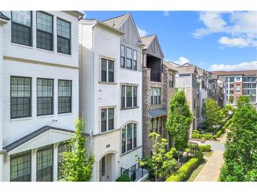 Beautiful new construction townhomes with brick exteriors and manicured landscaping in a desirable neighborhood at 513 Broadview Ln, Atlanta, GA 30324