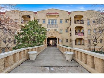 Charming Alhambra condos with attractive entrance and manicured landscaping create a welcoming atmosphere at 2855 Peachtree Ne Rd # 302, Atlanta, GA 30305