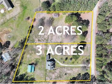 Aerial view of a 5-acre lot split into 2 and 3 acres, perfect for building your dream home or investment property at 3121 Cox Cemetery Rd, Social Circle, GA 30025