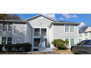 Attractive multi-Gathering building with light siding and an inviting entrance at 4252 Parkview Ct, Stone Mountain, GA 30083