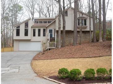 Charming two-story home with stone accents and a well-maintained front yard at 3572 Dexter Way, Marietta, GA 30062