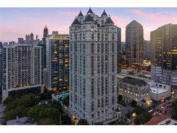 Beautiful view of a high-rise building and the city skyline during a gorgeous sunset at 195 14Th Ne St # 1404, Atlanta, GA 30309