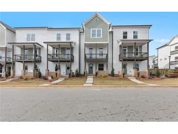 New townhomes feature balconies, neutral colors, and landscaping at 2219 Nena Way # 22, Tucker, GA 30084