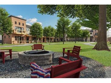 Inviting outdoor fire pit area with comfortable seating and community lawn at 941 Willingham Dr # 5, Hapeville, GA 30354