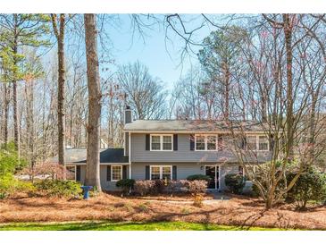 Charming two-story home with a well-maintained front yard and a classic, welcoming entryway at 2733 Eagle Ridge Rd, Marietta, GA 30062