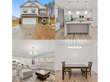 Beautiful two-story home featuring open concept living space, a kitchen island, and dining area at 114 Green Tree Ct, Dacula, GA 30019