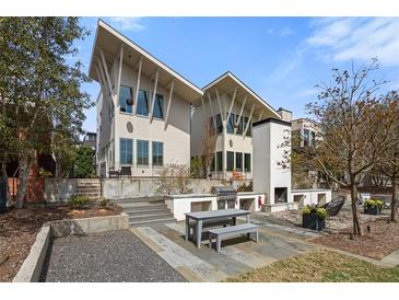 Modern home with outdoor kitchen, built in grill and a fireplace perfect for entertaining at 155 Breakspear Ln, Fayetteville, GA 30214