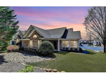 Charming single-story home with stone accents, manicured landscaping, and a welcoming front entrance at 1535 Duluth Hwy # 1001, Lawrenceville, GA 30043