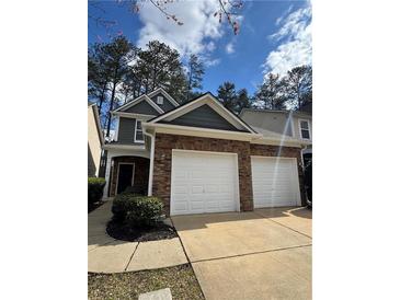 Charming two-story home featuring a two-car garage and stone accents at 108 Creekwood Trl, Acworth, GA 30102