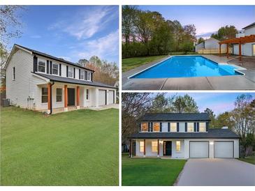 Charming two-story home featuring a well-manicured lawn and a two-car garage at 10540 Willow View Cir, Alpharetta, GA 30022