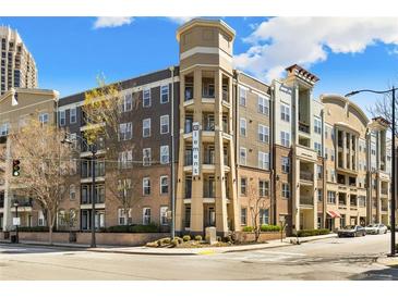 Beautiful condo exterior with large balconies and a building sign at 390 17Th Nw St # 5031, Atlanta, GA 30363