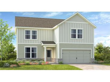 Charming two-story home with vertical siding, a covered entryway, and an attached two-car garage at 213 Groveton Ct, Euharlee, GA 30145