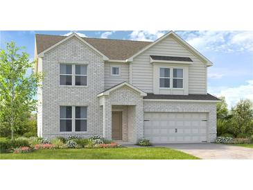 Charming two-story home with brick and siding exterior and well-manicured lawn at 217 Groveton Ct, Euharlee, GA 30145