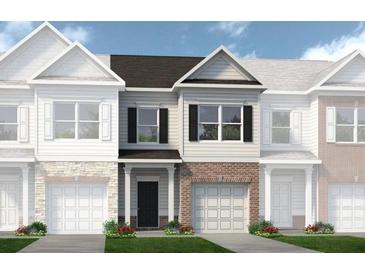 Charming townhome featuring a blend of brick and siding accents at 313 Skye Ln # 49, Cartersville, GA 30121
