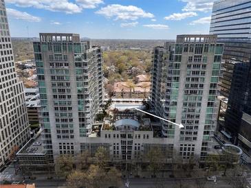 Stunning high-rise condo with luxurious amenities including a sparkling pool and beautiful city views at 923 Peachtree Ne St # 930, Atlanta, GA 30309