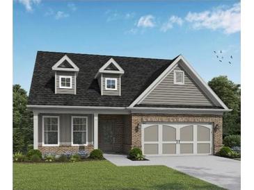 Charming single-Gathering home with a brick facade, dormer windows, and a two-car garage, perfect for comfortable living at 2469 Anhinga Dr, Loganville, GA 30052