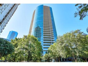 Modern high-rise building with stunning architecture and lush greenery at 3338 Peachtree Ne Rd # 2405, Atlanta, GA 30326