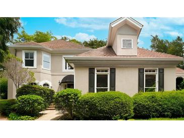 Charming home exterior featuring manicured landscaping and classic architectural details at 3655 Brisbane Dr, Marietta, GA 30062