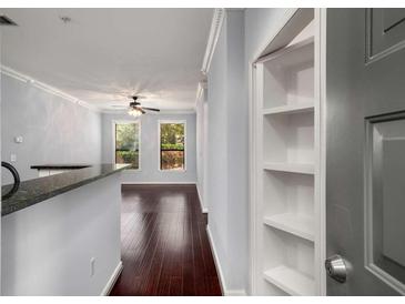 Inviting living room featuring hardwood floors and a view from the breakfast bar area at 821 Ralph Mcgill Ne Blvd # 2210, Atlanta, GA 30306