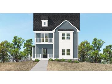 Charming two-story home with a welcoming front door, second story balcony, and a well-manicured yard at 3159 Stonegate Sw Dr, Atlanta, GA 30331