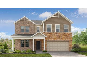 Two story home with a brick and stone facade, covered front porch, and manicured lawn at 1613 Caldwell Bend Ln, Dacula, GA 30019