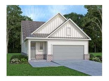 Charming one-story home with white siding, brick accents, and an attached two-car garage at 1826 Butterfly Way, Marietta, GA 30066