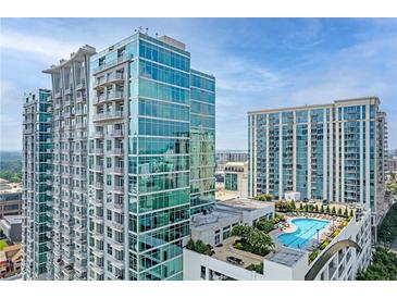 Luxury high-rise condos feature a rooftop pool, lush landscaping, and stunning city views at 250 Pharr Ne Rd # 2101, Atlanta, GA 30305