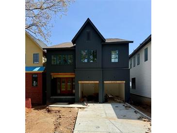 New construction showing a charming two-story home with a two-car garage at 2591 Apple Valley Rd, Brookhaven, GA 30319