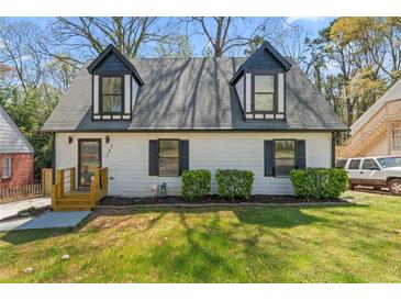 Charming renovated two-story home with a landscaped front yard and inviting curb appeal at 382 Deckner Sw Ave, Atlanta, GA 30310