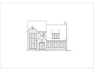 Charming home exterior featuring brick accents, a covered porch, and symmetrically placed windows providing curb appeal at 275 Heatherton Way, Milton, GA 30009